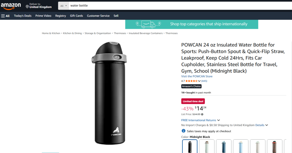 Black insulated water bottle with a push-button spout and quick-flip straw, ideal for travel and sports.