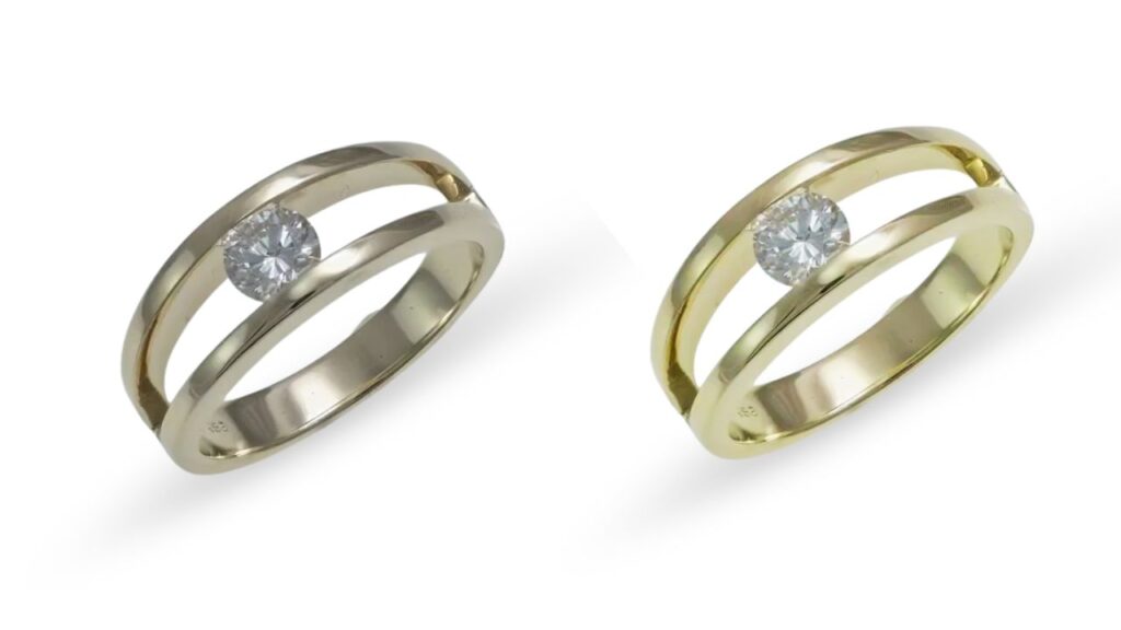 Two elegant engagement rings featuring a split band design with a single round diamond, one in silver and the other in gold, on a white background.