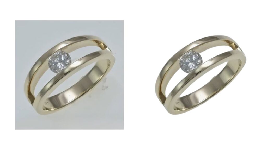 Two gold engagement rings with split bands feature a central round-cut diamond. The design is elegant, modern, and conveys a sense of sophistication.