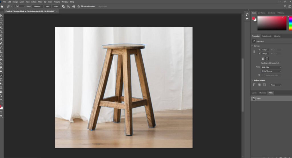 Image of a wooden stool marked with blue line displayed in adobe photoshop interface.