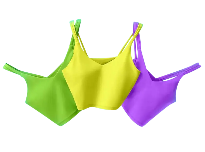 Three brightly colored crop tops on a light blue background. The tops are sleeveless with thin straps and are arranged side by side. From left to right, the colors are green, yellow, and purple. This image showcases the perfection achieved through expert color correction service.