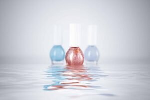 Three nail polish is reflecting on the water surface, bringing serenity and peace of mind to the viewers. 