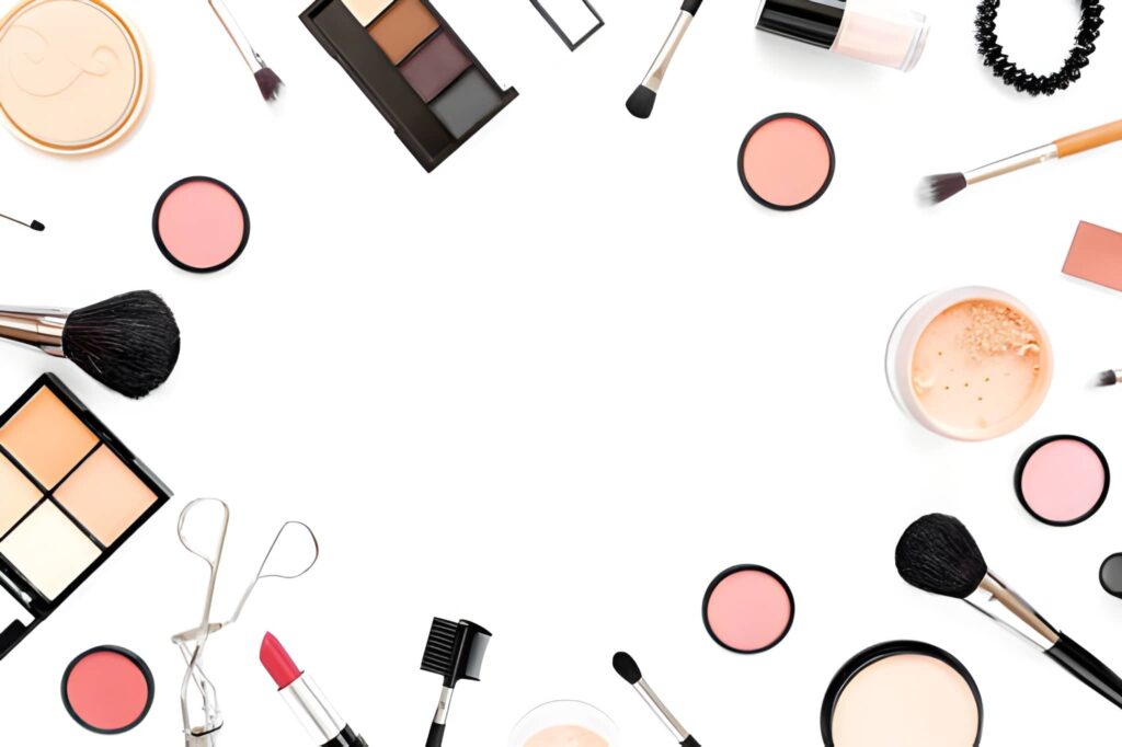Flat lay of professional makeup tools and brushes for makeup product photography.