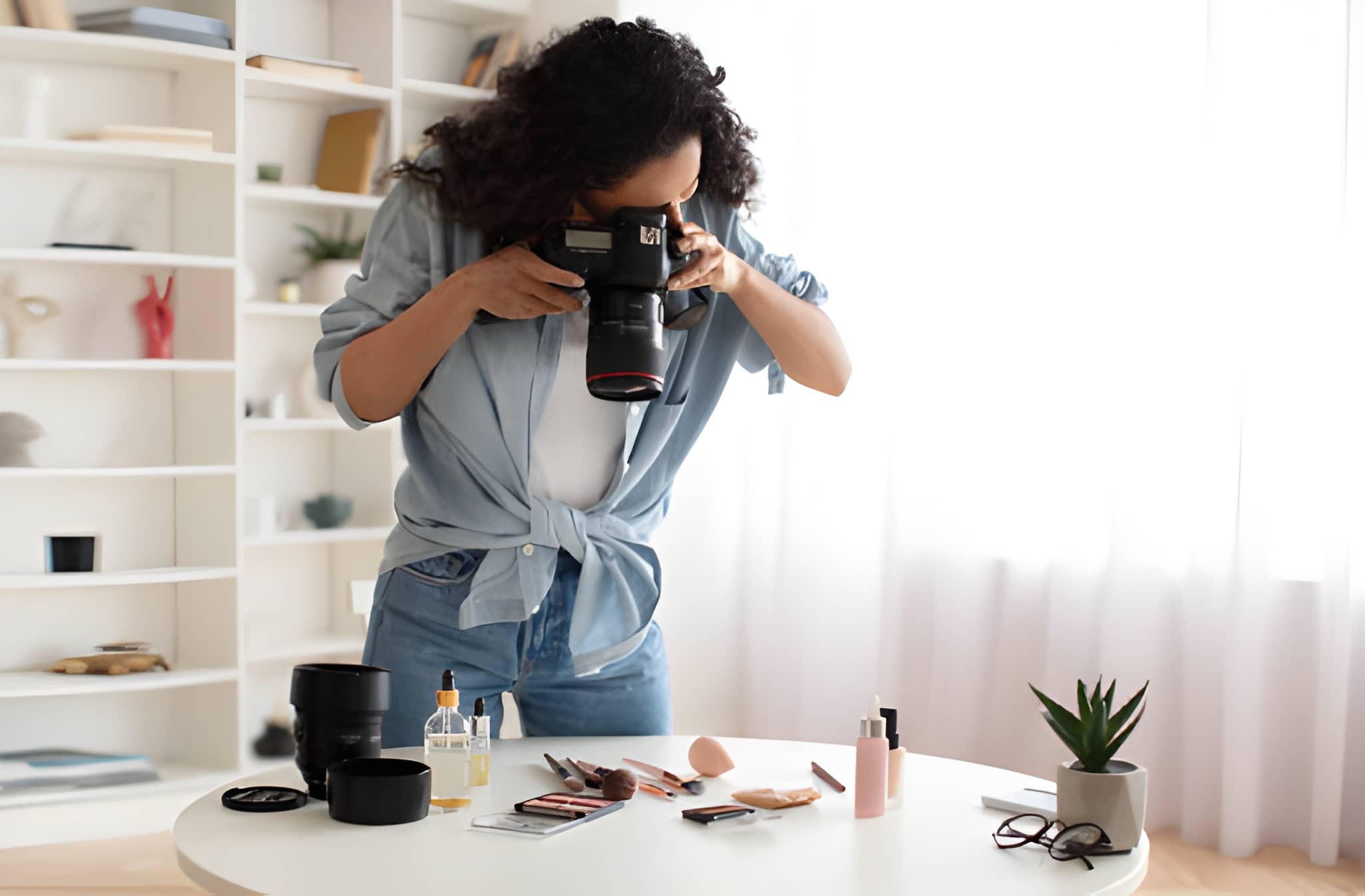 Makeup product photography using natural light on a white table.