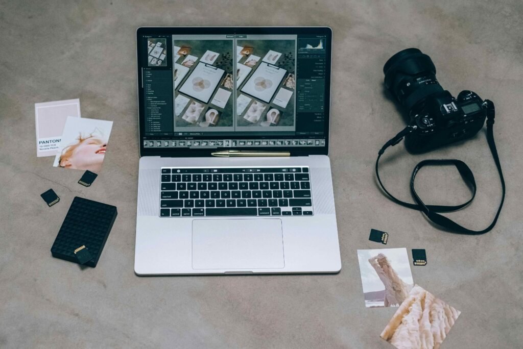 laptop, camera and other things displayed in a surface