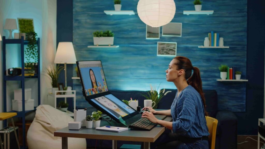 A woman working in front of a computer