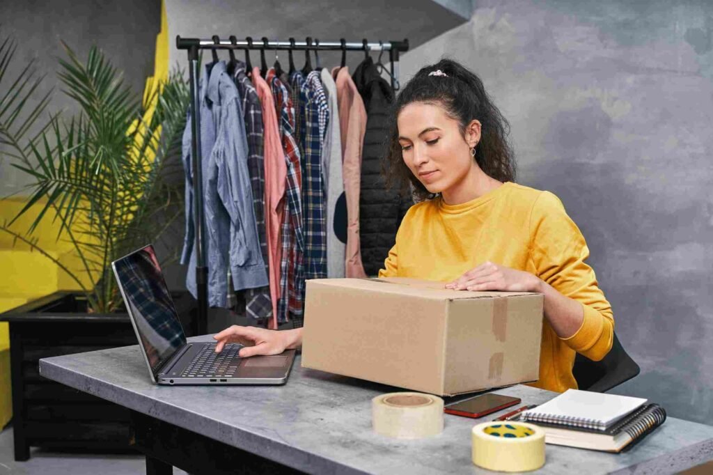 Woman with her laptop and product