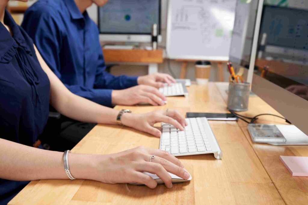 a group of people using computer