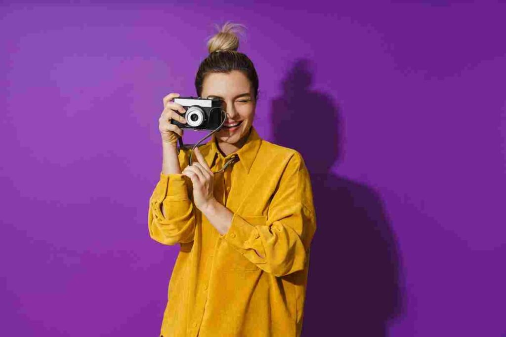 a young girl with camera