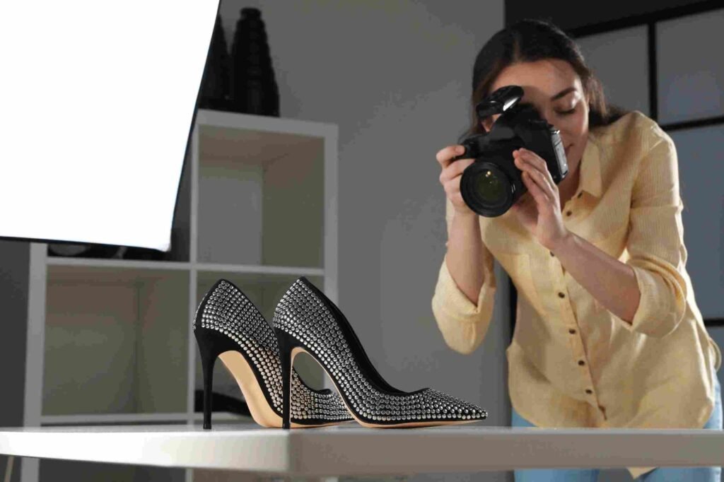 A woman doing product photography using DSLR 