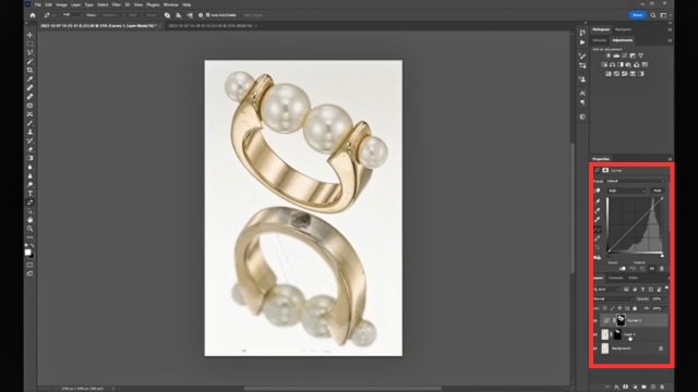 Add a Layer Mask to keep only the jewelry visible