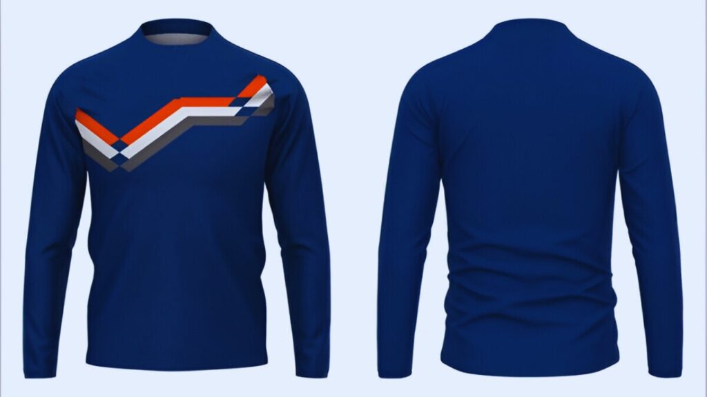 Blue long-sleeve shirt with a chevron design in orange, white, gray, and navy, showcased using invisible ghost mannequin photography for a clean, professional apparel display.